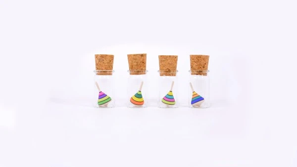 Mader Holzkreisel Harlekin Mini Im Glas 4 Mader Holzkreisel Harlekin Mini Im Glas – Bild 2